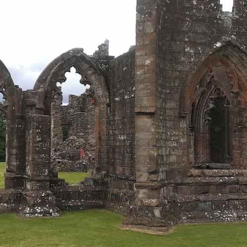 Not Crumbling Bricks And Blocks But Living Stones